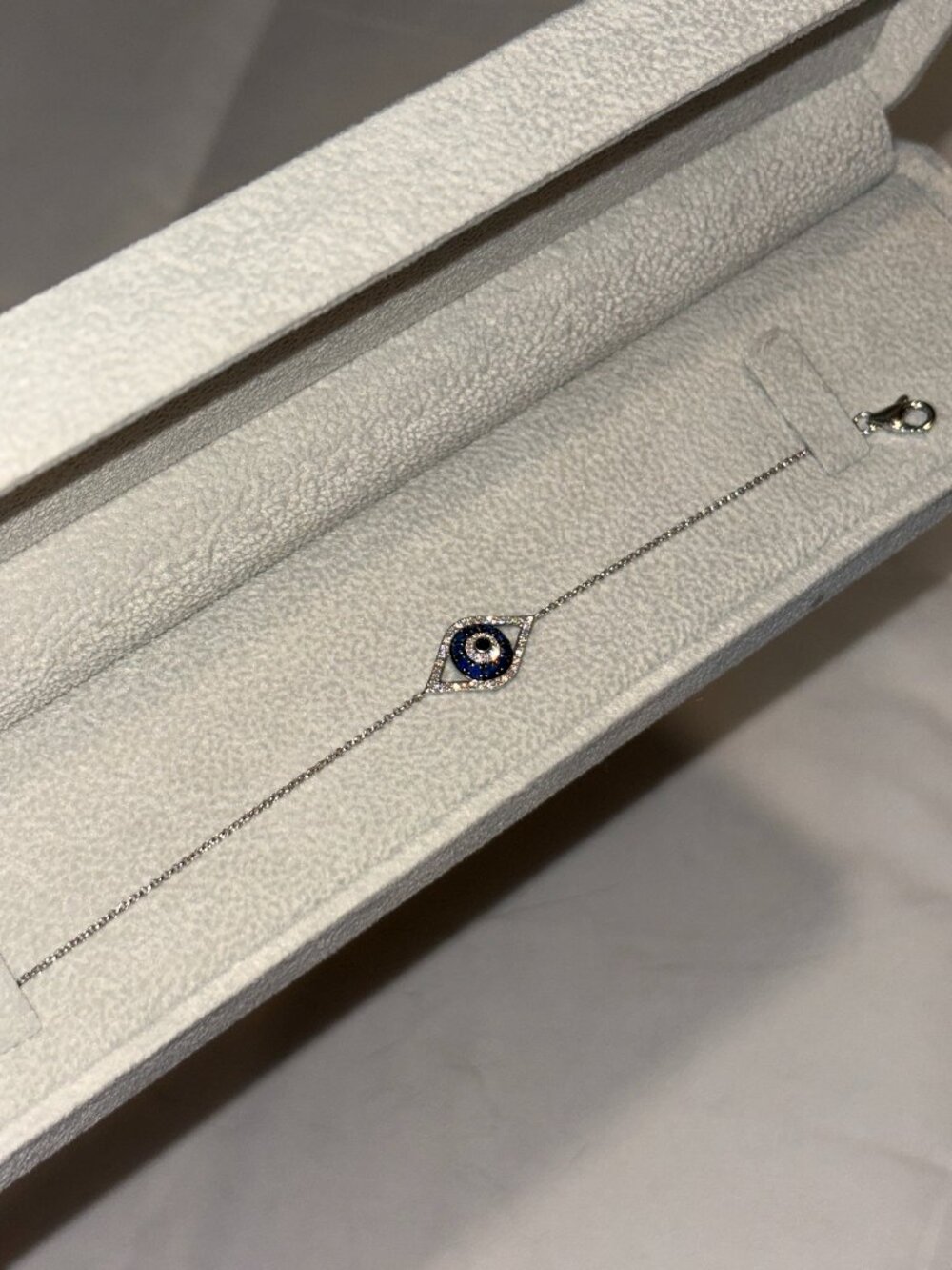Diamond and Blue Sapphire Evil Eye Bracelet in 14K White Gold